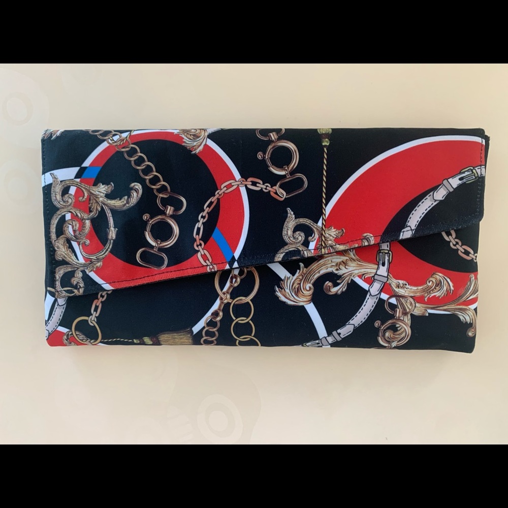 Handmade “BELTED CHAINS” clutch